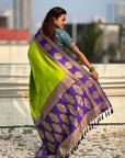Parrot Green Soft Silk Peacock Border Motifs Zari Woven Saree
