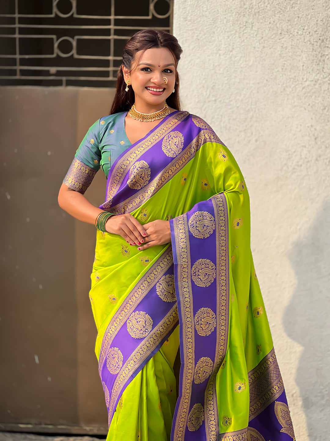 Parrot Green Soft Silk Peacock Border Motifs Zari Woven Saree