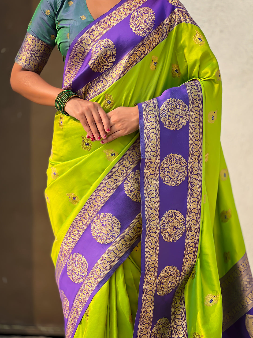 Parrot Green Soft Silk Peacock Border Motifs Zari Woven Saree
