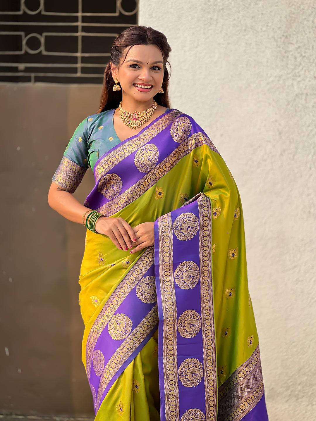 Mehendi Green Soft Silk Peacock Border Motifs Zari Woven Saree