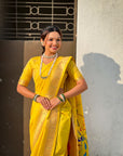Yellow Nauvari Pathani Silk Zari Woven Muniya Border Saree
