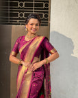 Wine Nauvari Pathani Silk Zari Woven Muniya Border Saree