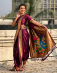 Wine Nauvari Pathani Silk Zari Woven Muniya Border Saree