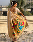 Cream Nauvari Pathani Silk Zari Woven Muniya Border Saree