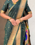 Bottle Green Nauvari Pathani Silk Zari Woven Muniya Border Saree