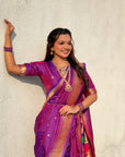 Purple (Red Tone) Nauvari Pathani Silk Zari Woven Muniya Border Saree