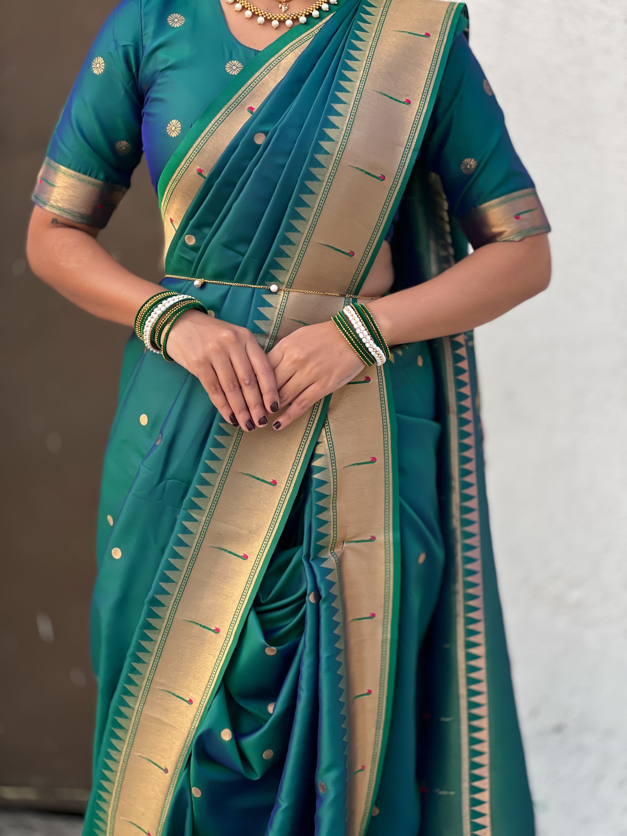 Peacock Blue Nauvari Pathani Silk Zari Woven Muniya Border Saree