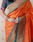 Orange Bandhani Weaves Silk Saree with Classic Border & Peacock Pallu