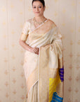 Cream Premium Silk with Zari Work & Rangoli Pallu