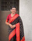 Black Soft Checks Pattern and Contrast Zigzag Border Silk Saree