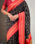 Black Soft Checks Pattern and Contrast Zigzag Border Silk Saree