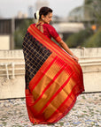 Black Soft Checks Pattern and Contrast Zigzag Border Silk Saree