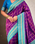 Purple Soft Checks Pattern and Contrast Zigzag Border Silk Saree