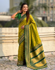 Mehendi Green Soft Checks Pattern and Contrast Zigzag Border Silk Saree