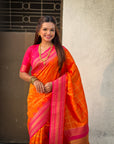 Orange Soft Checks Pattern and Contrast Zigzag Border Silk Saree