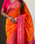 Orange Soft Checks Pattern and Contrast Zigzag Border Silk Saree