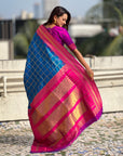 Rama Blue Soft Checks Pattern and Contrast Zigzag Border Silk Saree