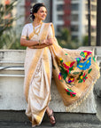 Cream Nauvari Pathani Silk Zari Woven Muniya Border Saree