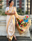 Cream Nauvari Pathani Silk Zari Woven Muniya Border Saree