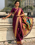 Wine Nauvari Pathani Silk Zari Woven Muniya Border Saree