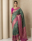 Peacock Blue Soft Ikkat Patola Silk Geometric Ikkat Weaves Saree