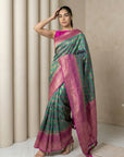 Peacock Blue Soft Ikkat Patola Silk Geometric Ikkat Weaves Saree