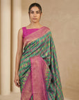 Peacock Blue Soft Ikkat Patola Silk Geometric Ikkat Weaves Saree
