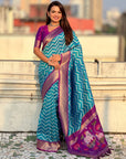 Sky Blue Soft Ikkat Leheriya Patola Silk Zari Woven Saree