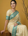 Cream & Blue Soft Handloom with detailed Motifs Silk Saree