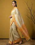 Cream & Yellow Soft Handloom with detailed Motifs Silk Saree