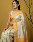 Cream & Yellow Soft Handloom with detailed Motifs Silk Saree