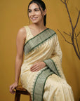 Cream & Green Soft Handloom with detailed Motifs Silk Saree