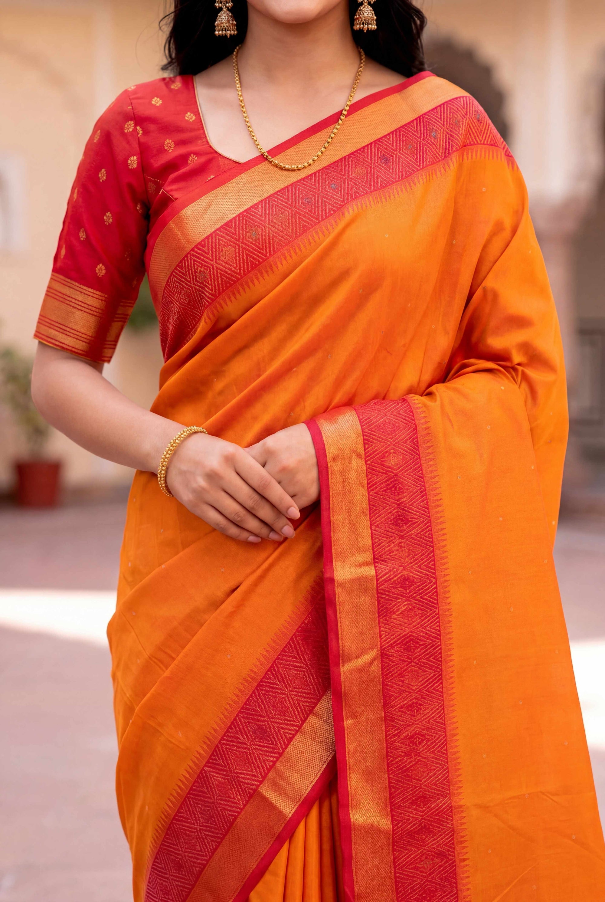Orange Soft Ikkat Pochampally Patola Silk Zari Woven Saree